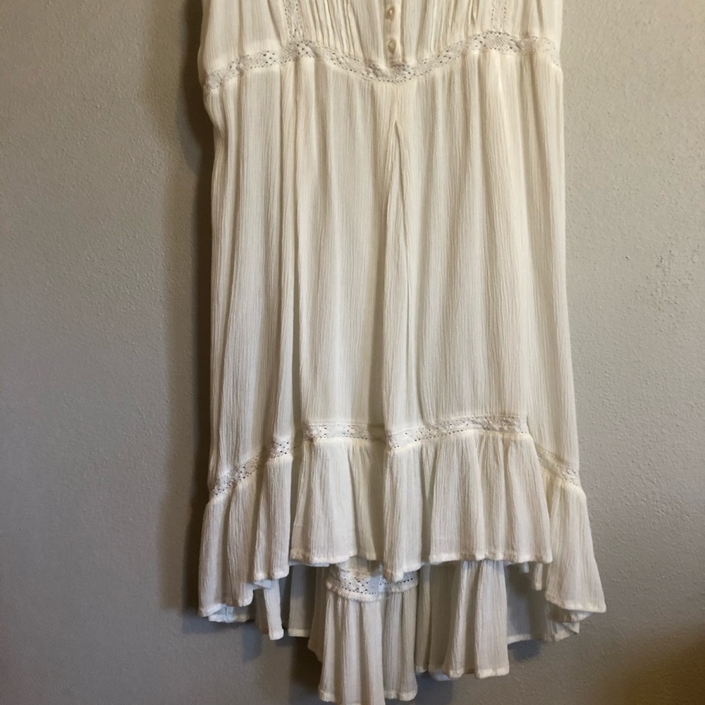Light weight, sheer, white high low dress.